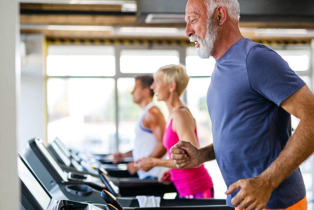Elderly Man Exercising on a Treadmill Cardiac Rehabilitation for Seniors